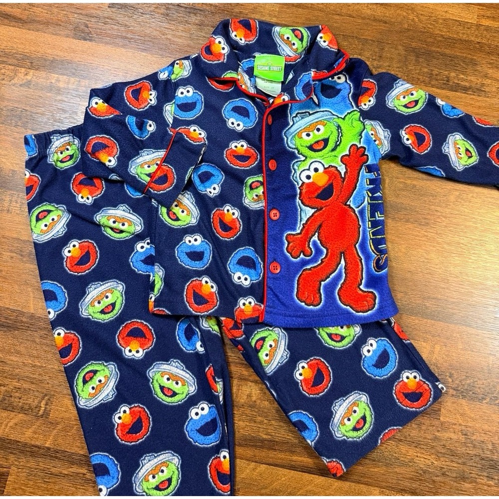 Sesame Street Elmo, Cookie Monster, Oscar the grouch pajama set sz 2T from 2012